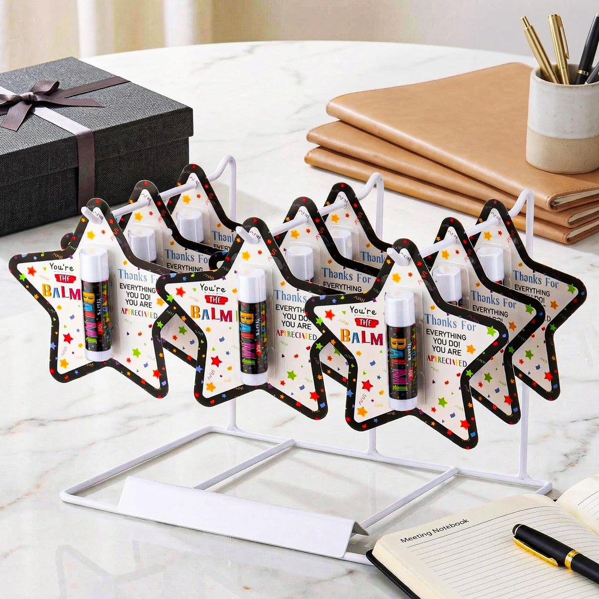 Sacubee display-ready lip balm set on a desk for colleagues.