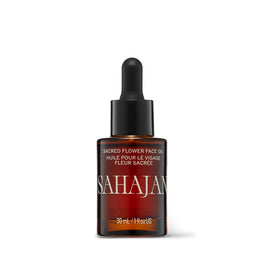 Sahajan Sacred Flower Oil bottle shows kumkumadi blend for radiant skin.