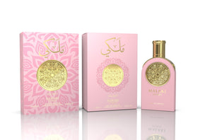 Sahari Malaki Secret EDP bottle on silk evokes refined, long lasting scent moments