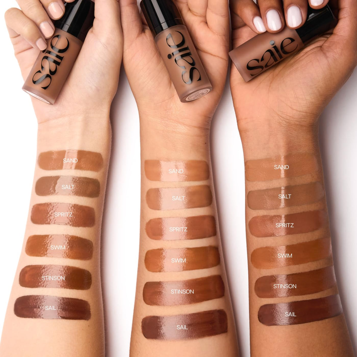 Saie Dew Bronze under-cheekbone sculpt for soft definition and dimension.