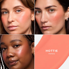 Saie Dew Liquid Blush swatch on cheek delivering a buildable glow.