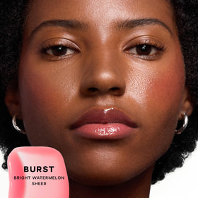 Saie Glossybounce applicator closeup for easy center-lip dab