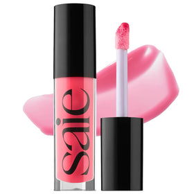 Saie Glossybounce bottle swirl shows luminous, non-sticky shine for daily lips.