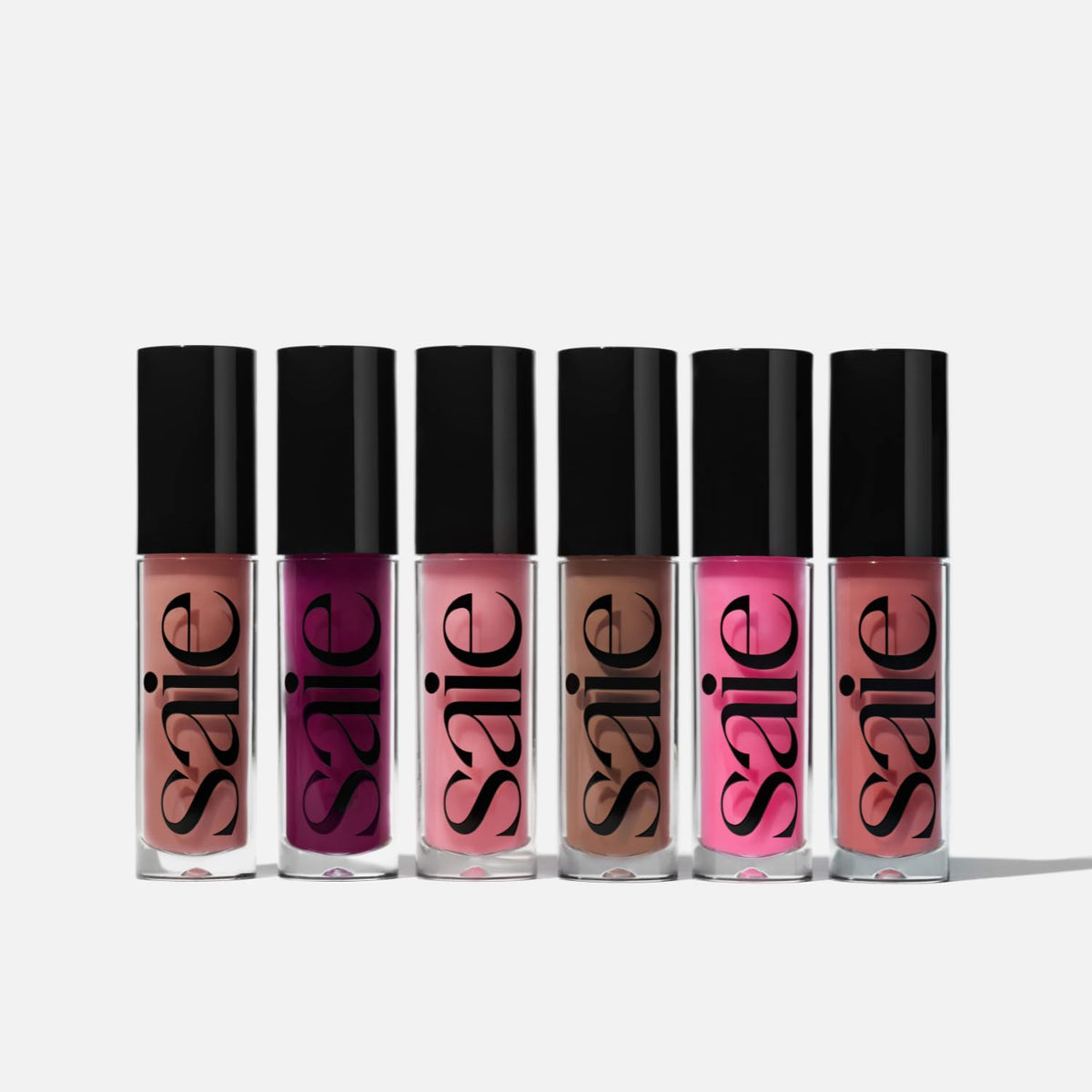 Saie Glossybounce soft lip hydration scene suggests comfortable, non-sticky wear.