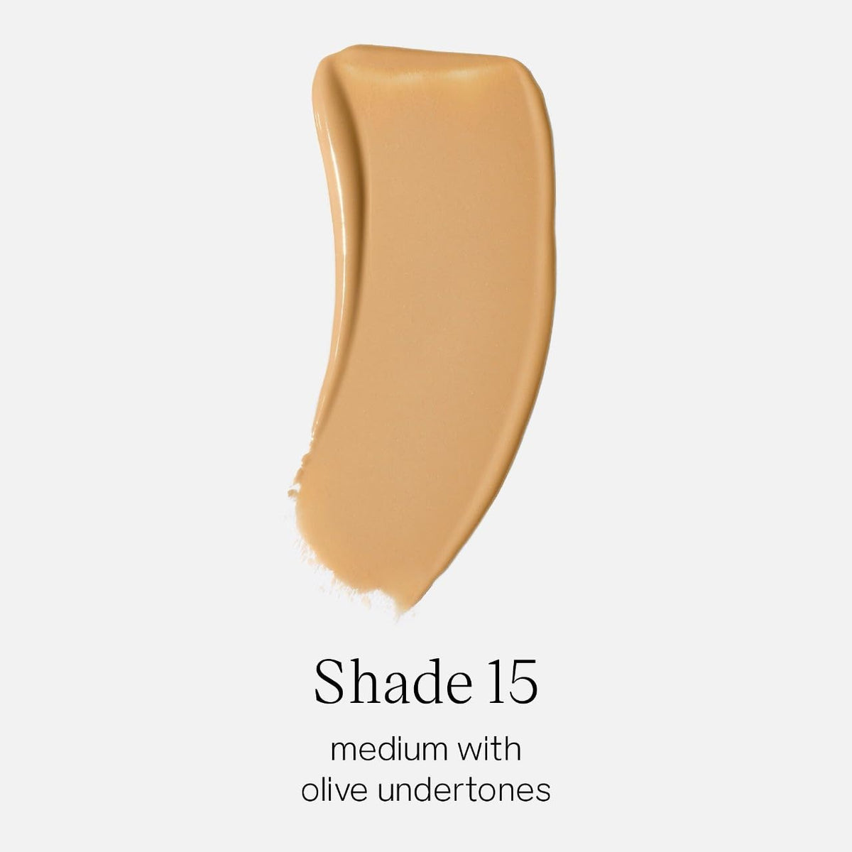 Saie Glowy Super Skin Tint bottle side view highlighting olive undertones for balanced skin tone