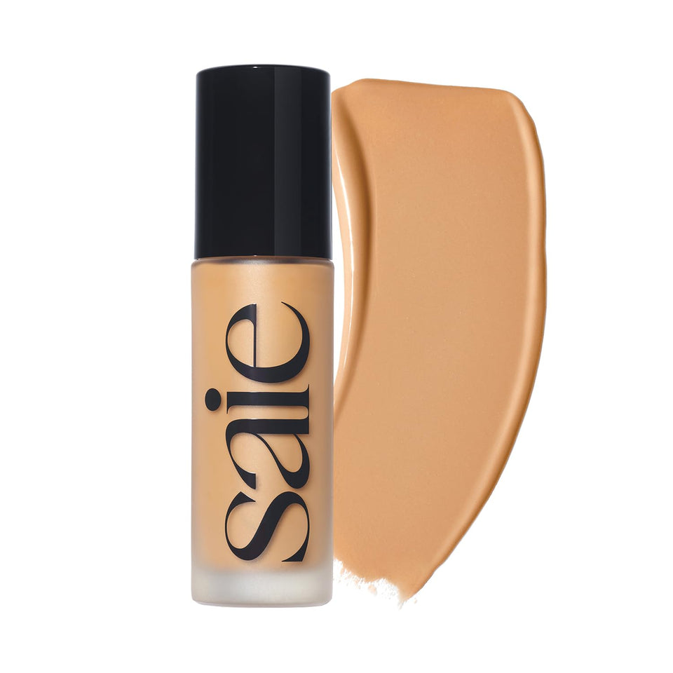 Saie Glowy Super Skin Tint bottle close-up showing sleek packaging for dewy medium coverage.