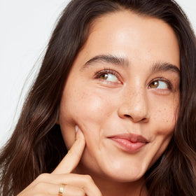 Pump dispense of Saie Glowy Super Skin Tint for easy application.