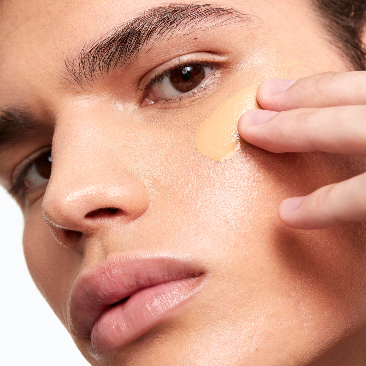 Saie Glowy Super Skin Tint shade 16 swatch for warm medium tone.