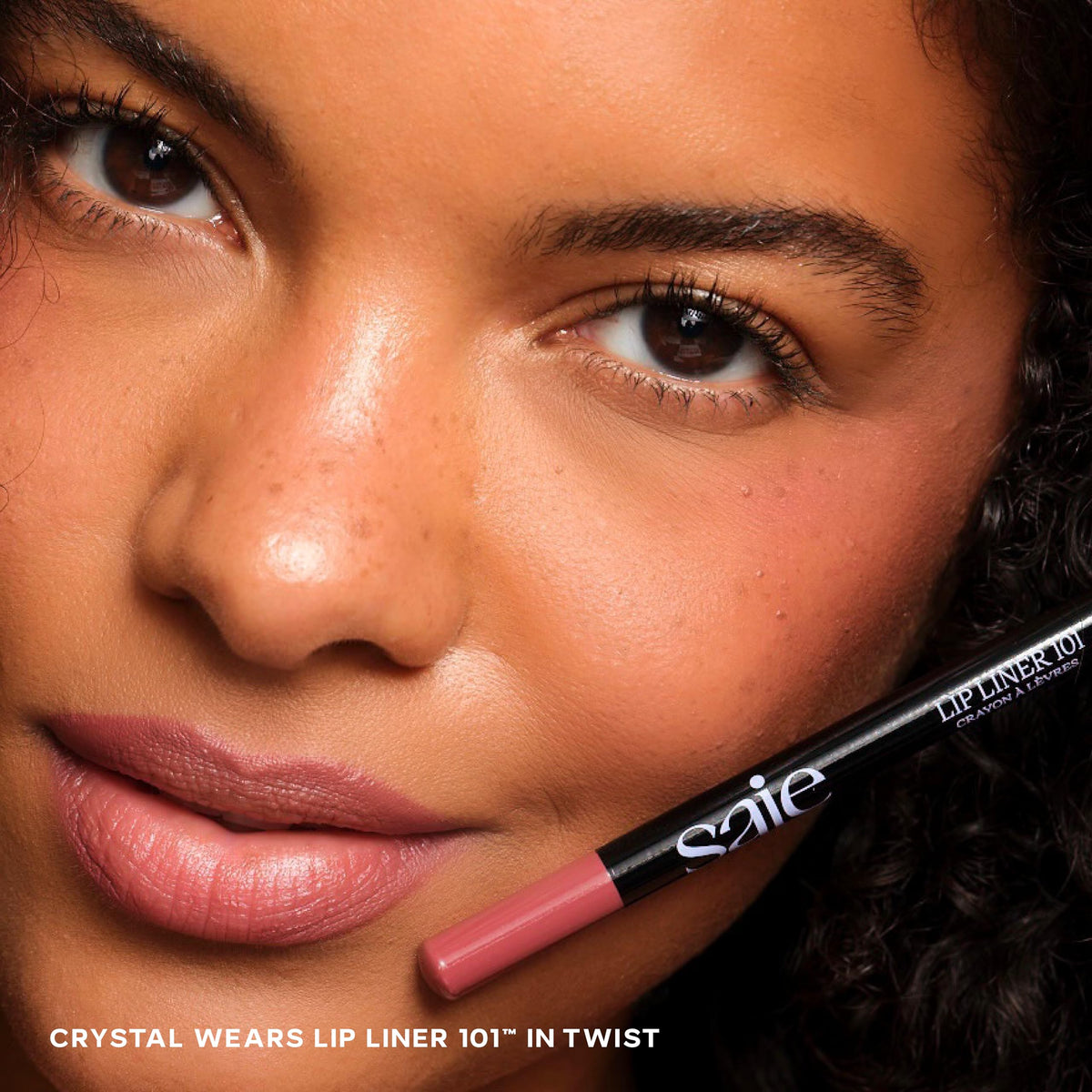 Natural frame definition with Saie Lip Liner 101 for precise shaping.