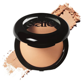 Saie Slip Tint Baked Setting Powder in pan for translucent coverage and blurring