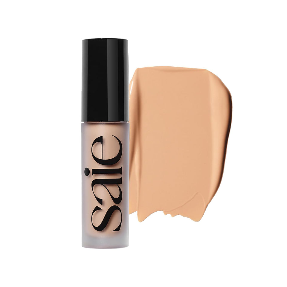 Saie Slip Tint concealer with a doe-foot applicator for precise under-eye coverage.