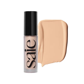 Saie Slip Tint packaging close-up for easy, on-the-go makeup.