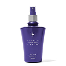 Saints and Sinners Velvet Divine leave-in bottle pour for smooth, manageable hair.