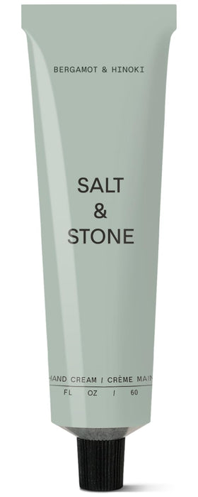 Salt & Stone hand cream bottle front showing saffron and cedar formula for daily hydration.