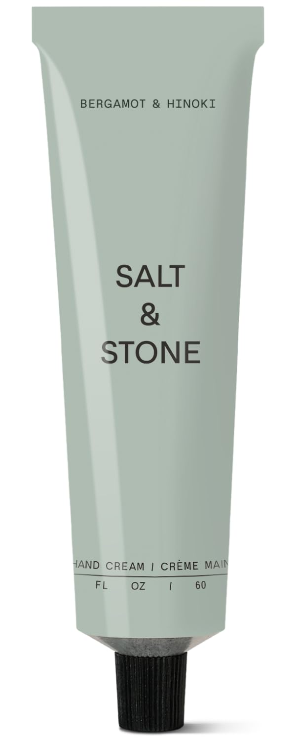 Salt & Stone hand cream bottle front showing saffron and cedar formula for daily hydration.