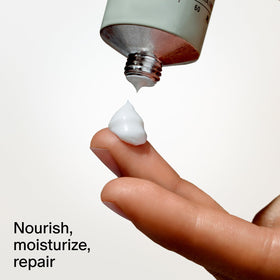 Hands applying Salt & Stone hand cream after washing for nourished, soft skin.