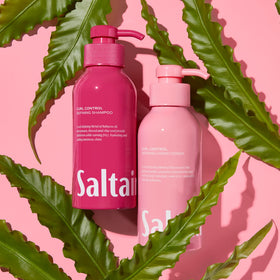 Saltair curl care set displayed on bathroom shelf