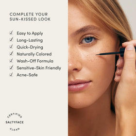 SALTYFACE Freckle Paint blended across nose for a natural sun-kissed finish.