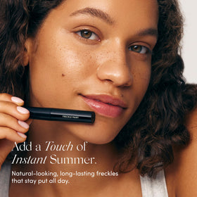 SALTYFACE Freckle Paint dots on cheek demonstrate easy blending for subtle freckles.