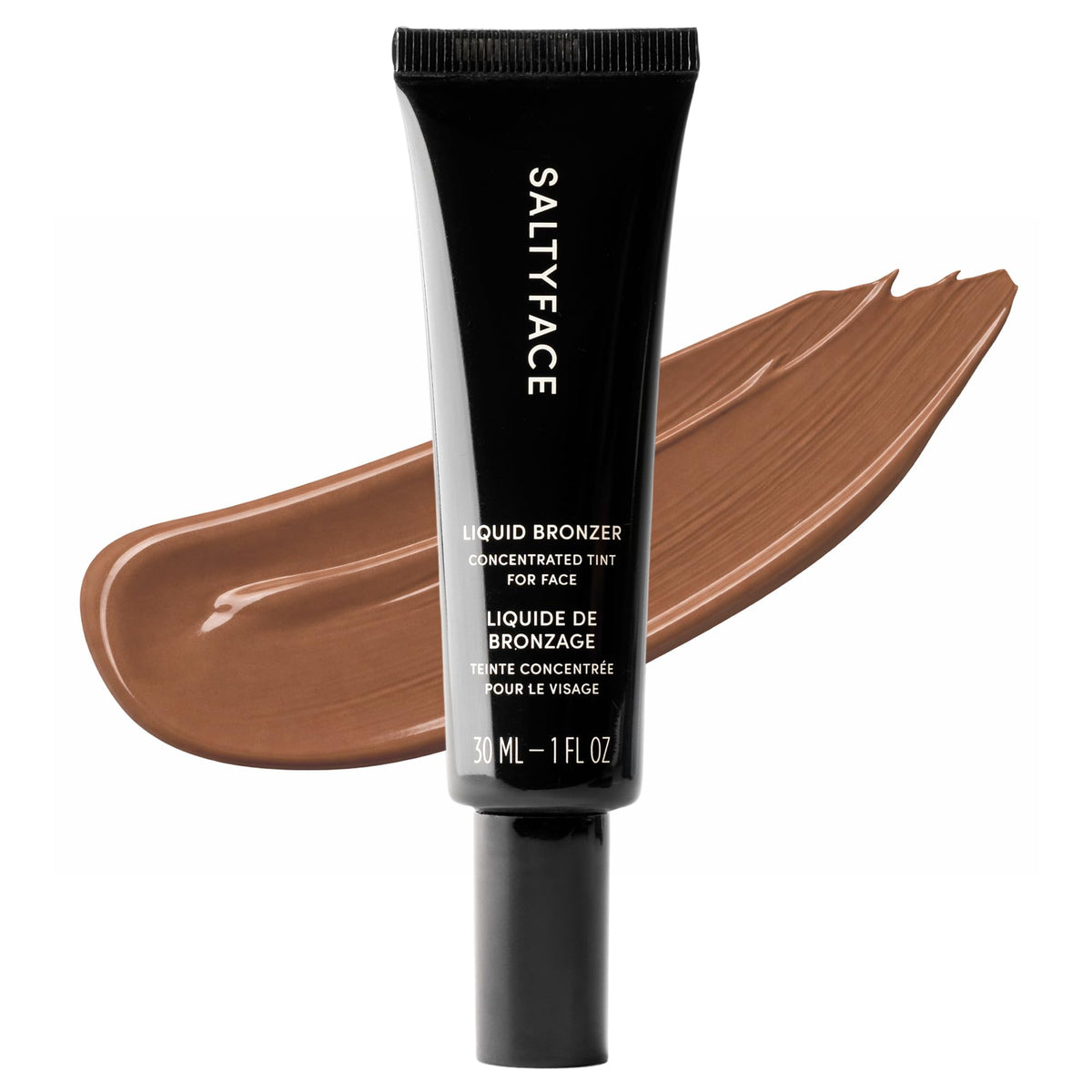 SALTYFACE Liquid Bronzer bottle pour creates a natural bronze glow.
