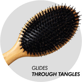 Sam Villa Signature Series brush used during blow-drying for shine and control.
