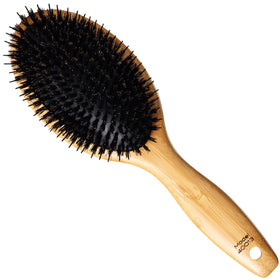 Sam Villa Signature Series boar bristle brush closeup showing oil distribution.