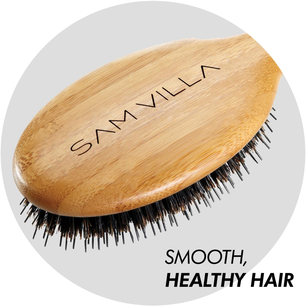 Sam Villa Signature Series boar bristle brush during styling with heat.