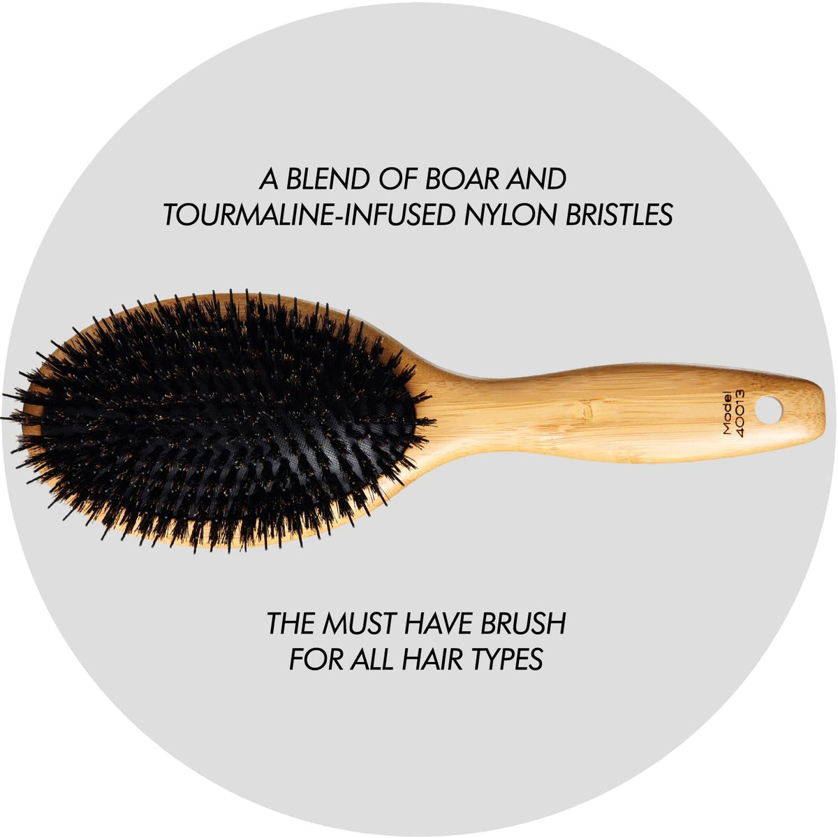 Sam Villa Signature Series tourmaline-infused bristles condition hair during styling.