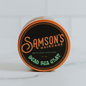 SAMSON'S HAIRCARE Dead Sea Styling Clay texture on hair for natural feel.
