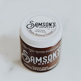 Close-up of SAMSON'S HAIRCARE Matte Styling Cream texture for a smooth, non-greasy feel.