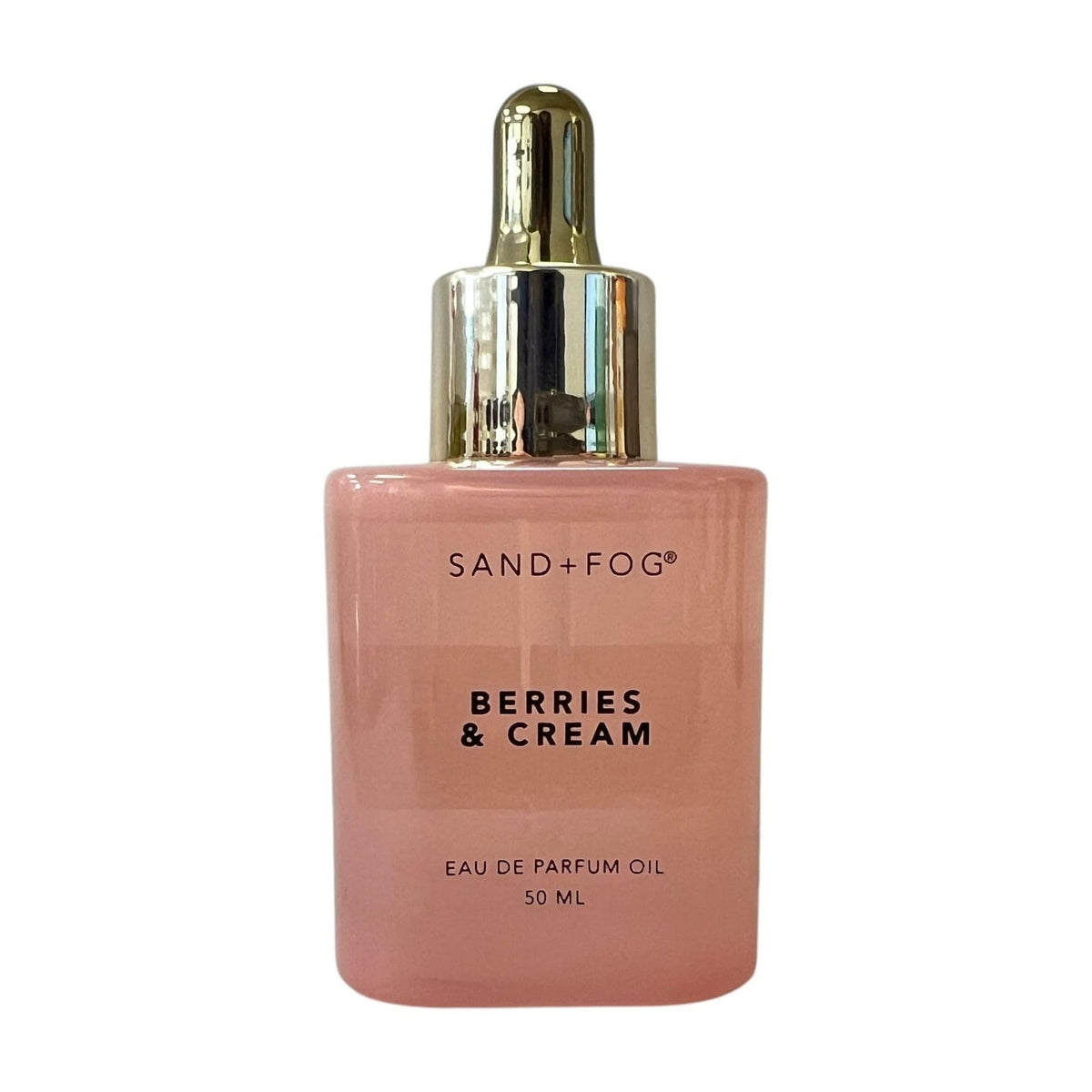 Sand + Fog Berries & Cream EDP Oil bottle on a shelf, long-lasting fragrance for daily wear
