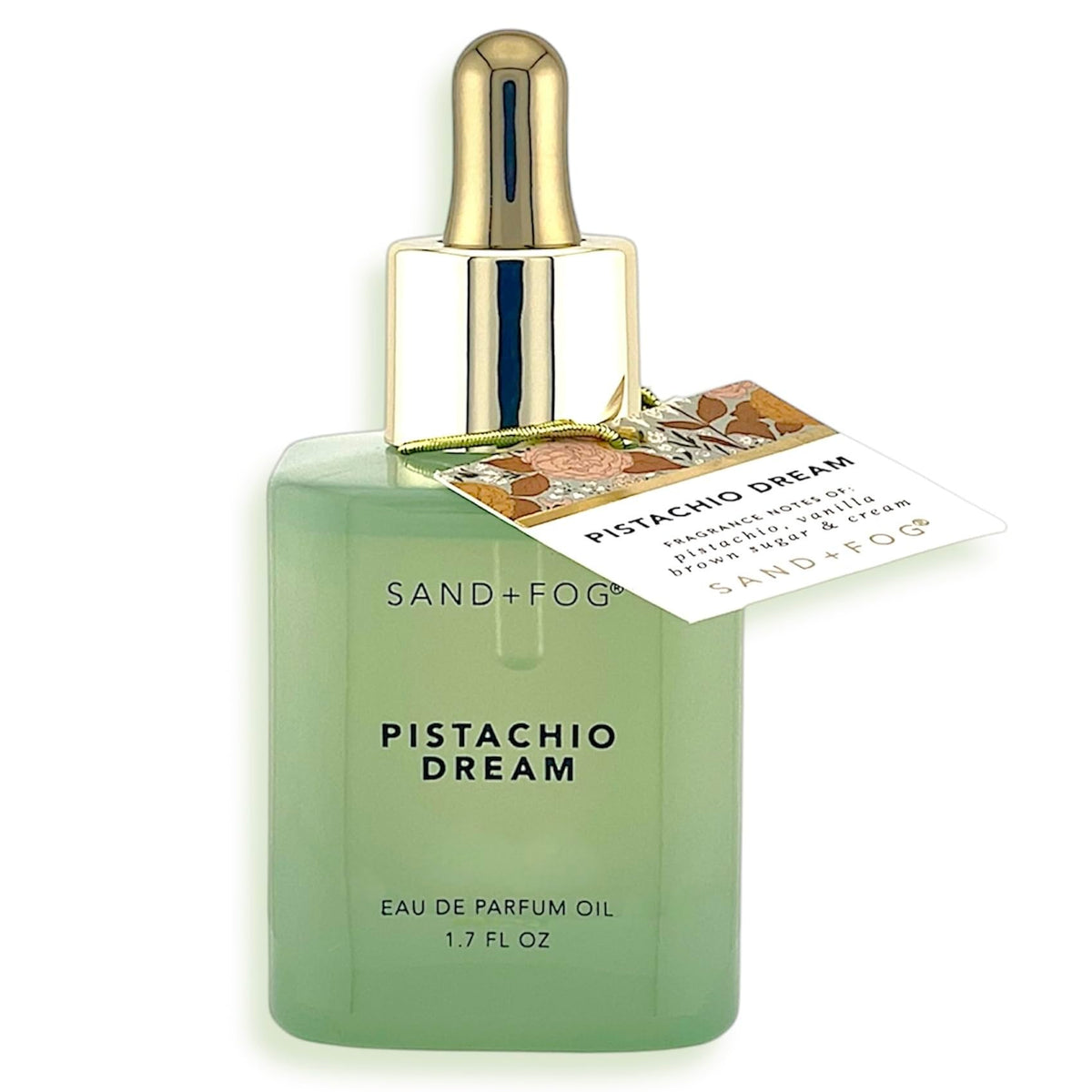 Sand + Fog Pistachio Dream oil bottle with mint glass shows premium packaging and long-lasting scent.