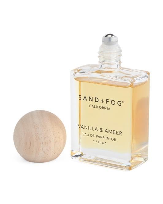 Sand + Fog roll-on applicator close-up for on-the-go scent touch-ups.