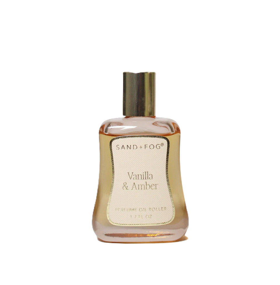 Sand + Fog Vanilla and Amber perfume oil bottle with roll-on for long-lasting scent