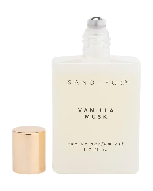 Sand + Fog Vanilla Musk roll-on being applied to pulse points for a personal aroma