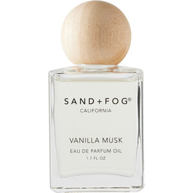 Sand + Fog Vanilla Musk rollerball bottle with elegant packaging.