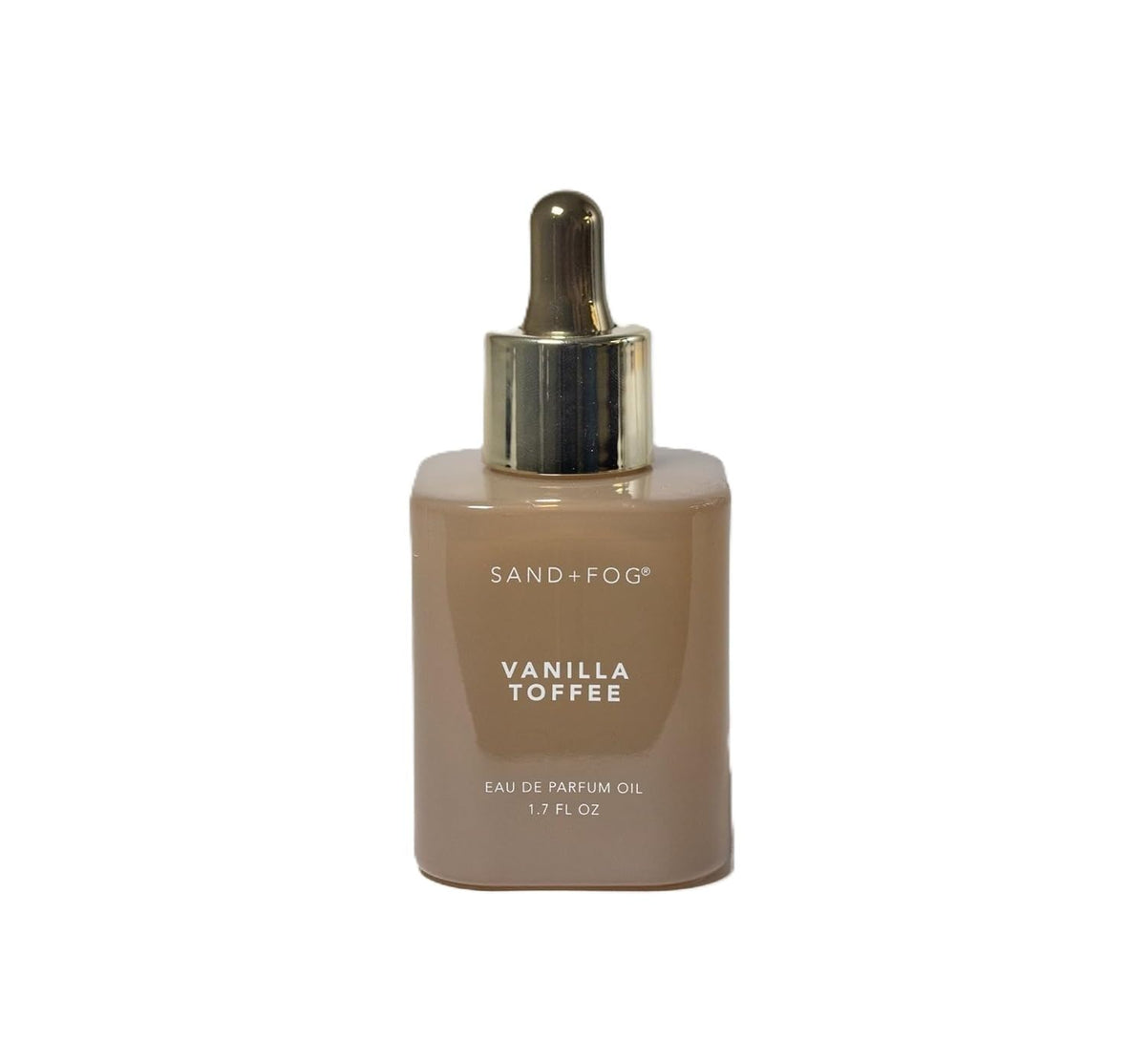 Sand + Fog Vanilla Toffee perfume oil bottle on vanity, ideal for daily wear.