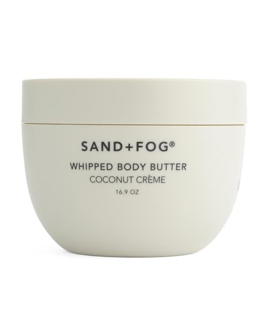 Sand + Fog whipped body butter jar with coconut cream scent for deep hydration and spa-like aroma.