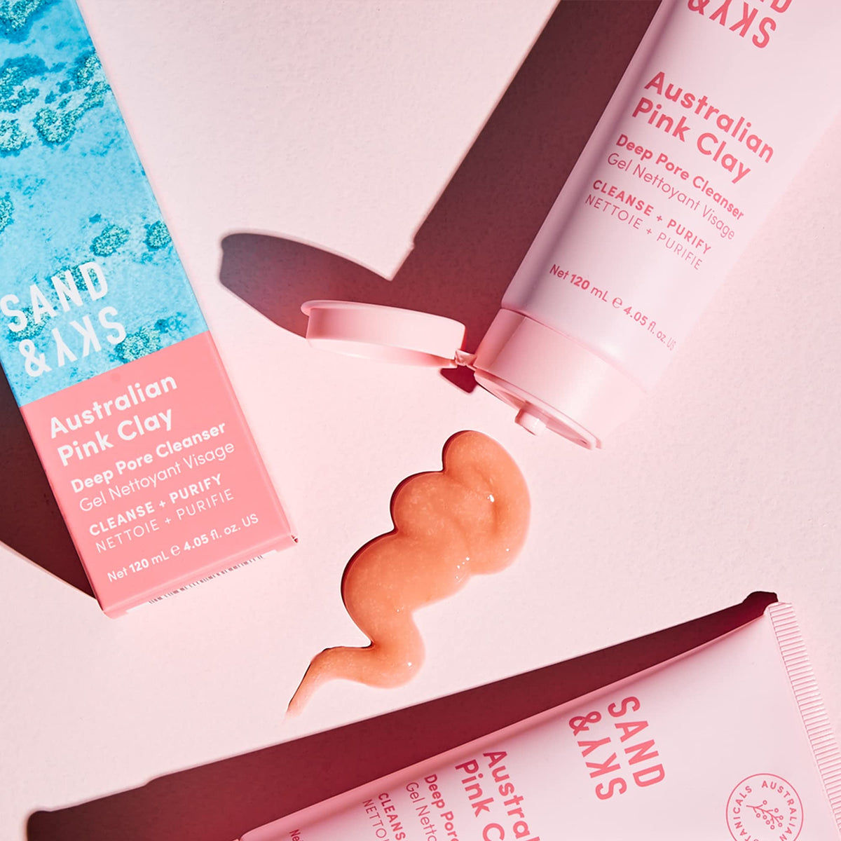 Sand & Sky Pink Clay texture close-up highlights gentle exfoliation for daily use.