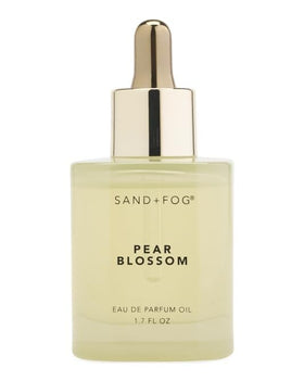 Sand + Fog Pear Blossom bottle pour close-up for on-skin use