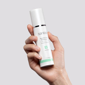 SANITAS Skincare Sensitive Skin Moisturizer ingredients hydration image showcases nourishing oils and butters for calm, hydrated skin.
