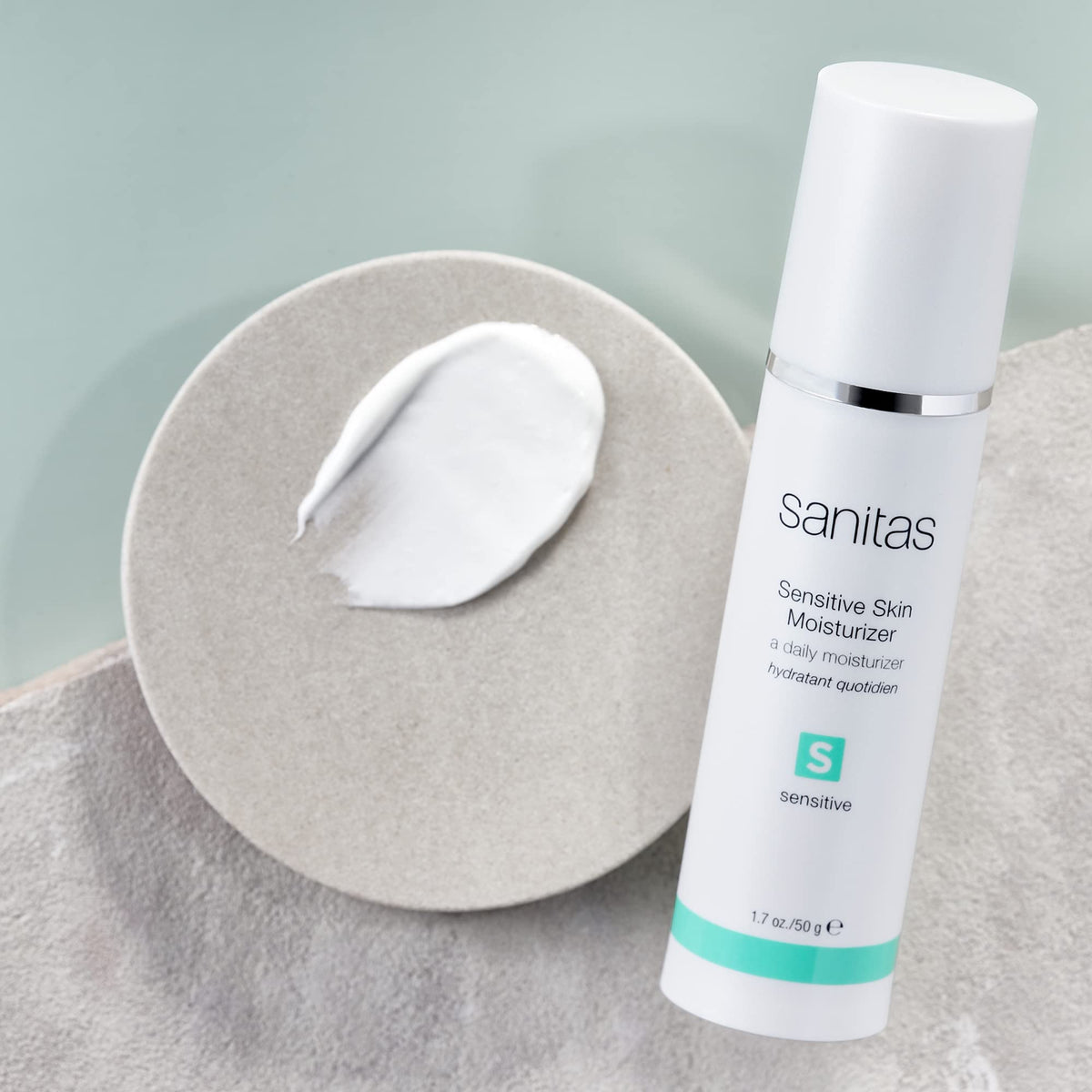 SANITAS Skincare Sensitive Skin Moisturizer texture close-up shows creamy, non-greasy feel for sensitive skin.