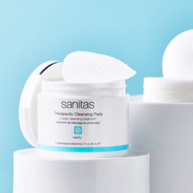 Sanitas cleansing pads clarifying application close-up highlighting exfoliation and pore care