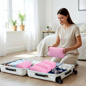 Sanwuta travel-friendly cosmetic bag in pink, fits skincare and toiletries.