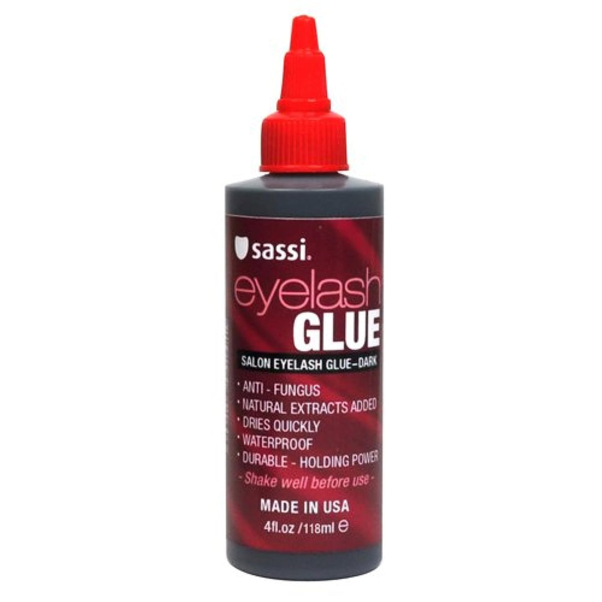 Sassi Eyelash Glue Dark bottle pour demonstrates quick-dry lash adhesion.