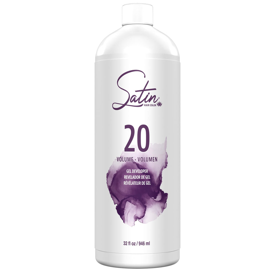 Satin 20 Volume Cream Developer bottle pour for balanced lift and color activation.
