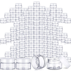 SATINIOR 2 oz jars with lids for travel-friendly organization.