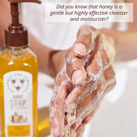 Savannah Bee Company bottle close-up highlights aloe vera and Tupelo honey ingredients for gentle cleansing.
