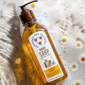 Savannah Bee Company hand soap in hand demonstrates moisturizing hands throughout daily routine.