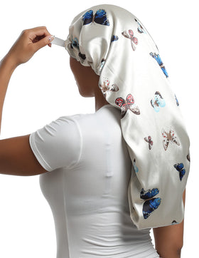 SAYMRE satin bonnet with adjustable strap for secure overnight wear.